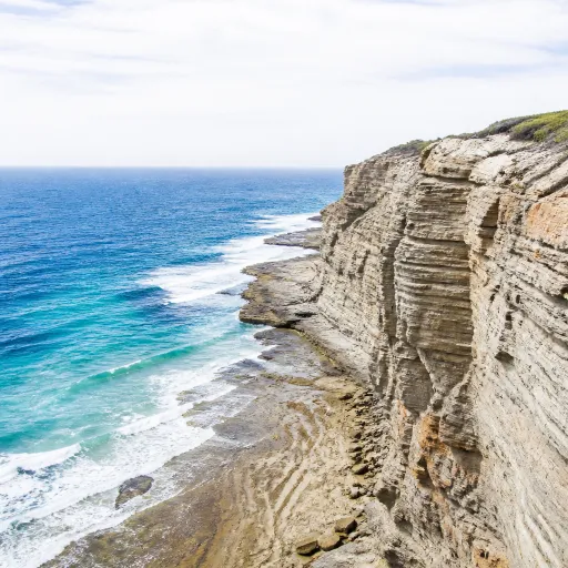 The June Workload Cliff: Why Summer Burnout Starts Before Anyone Books a Flight